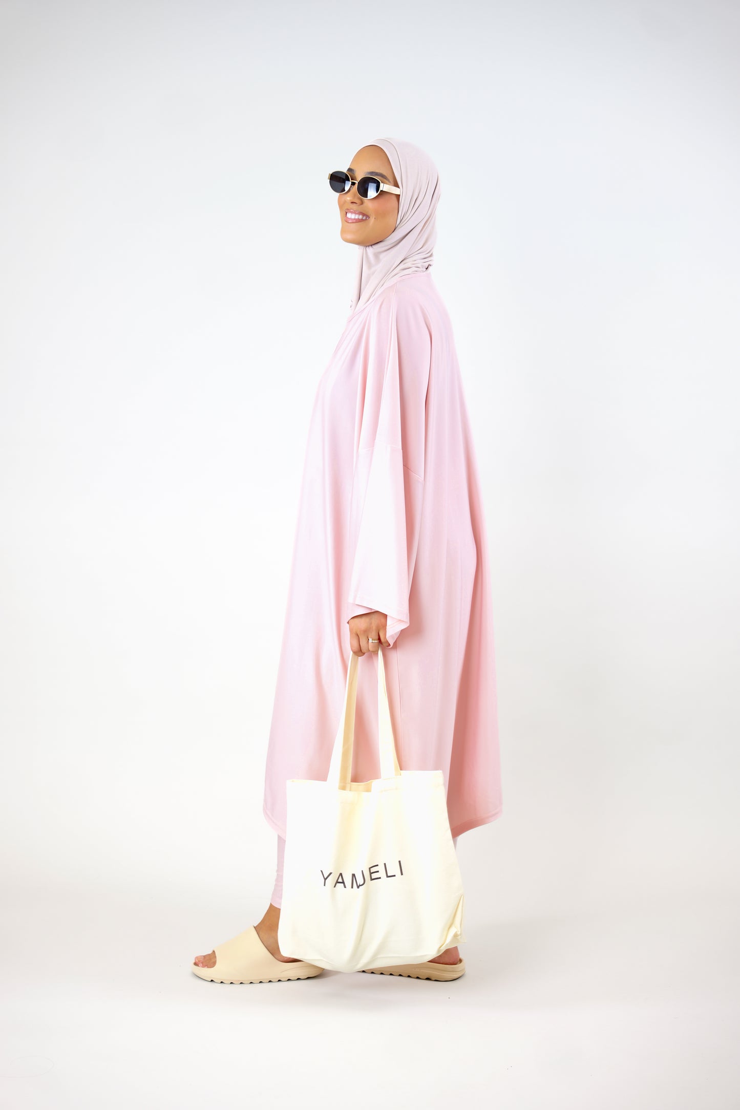 Cache-maillot rose tendre avec leggings
