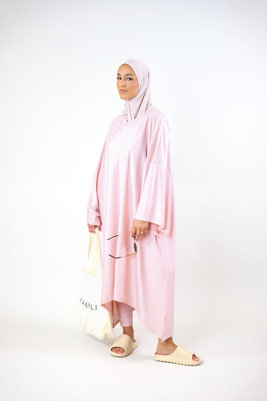 Cache-maillot rose tendre avec leggings